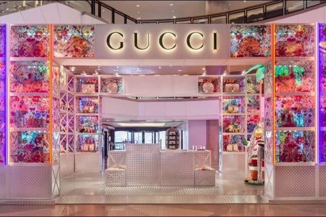 If you deny the acquisition of Moncler, how will Gucci's parent company win the luxury purchase war?