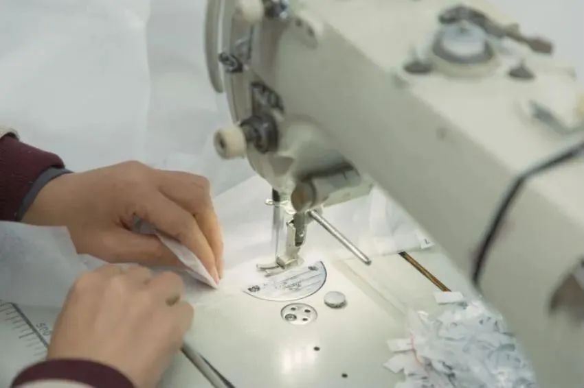 Send a sewing machine to a Chinese female worker, she can return you a production line to save the world