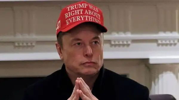 Tesla CEO Elon Musk wears a Trump Was Right About Everything hat while attending a cabinet meeting at the White House in Washington on March 24. REUTERS/Carlos Barria/File Photo